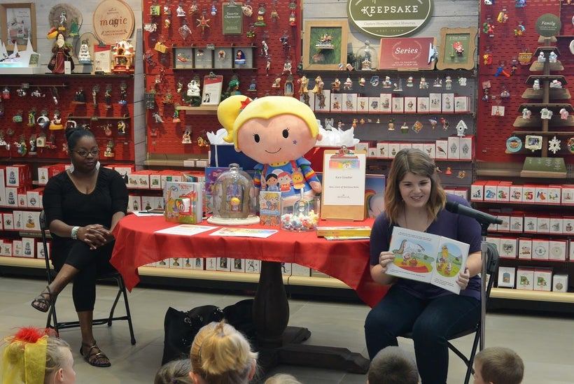 Kara Goodier reading "Rainbow Brite and the Very Brave Day" with author Melvina Young