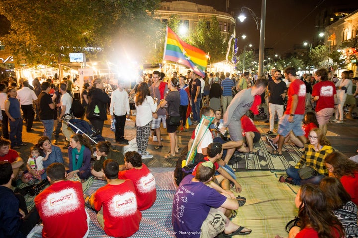 Dialogue circles and discussion at "Meeting Place" initiative in Zion Square, Jerusalem, Israel.