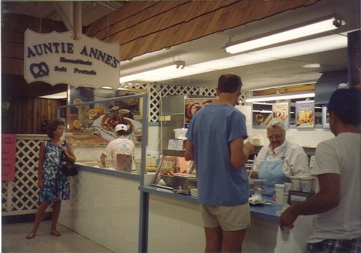 Anne oversees operations at the first Auntie Anne’s location, a farmer's market stand in Downingtown, Pennsylvania.