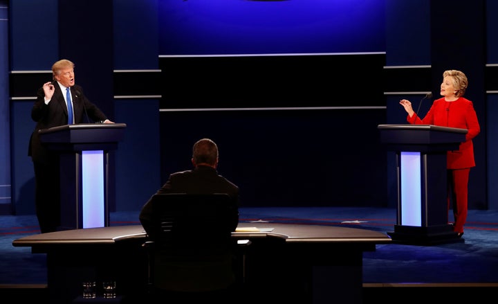 Republican U.S. presidential nominee Donald Trump and Democratic U.S. presidential nominee Hillary Clinton speak at their first presidential debate at Hofstra University in Hempstead, New York, U.S., September 26, 2016.