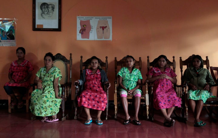 Pregnant teenagers sit inside a maternity home in Jinotega city, some 160 km (99 miles) north of Managua October 24, 2013. According to the United Nations Population Fund (UNFPA), Nicaragua has one of the highest rates of teenage pregnancy in Latin America where between 13,000 and 16,000 adolescents give birth every year, counting for about 16% of the total births in the country.