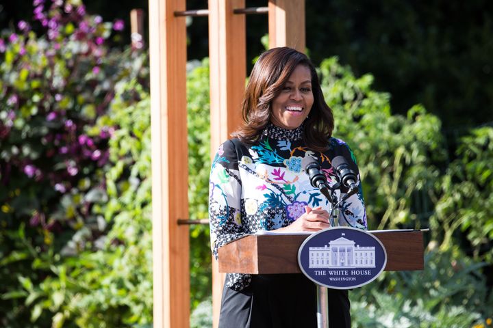 Michelle Obama addresses the audience at her final fall harvest in the White House garden.