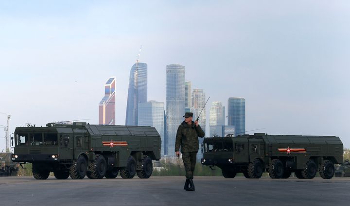Pictured here, a Russian serviceman walks past Russian Iskander-M missile launchers in Moscow, Russia, on May 5, 2016. Russia has moved such missiles into the Kaliningrad enclave.