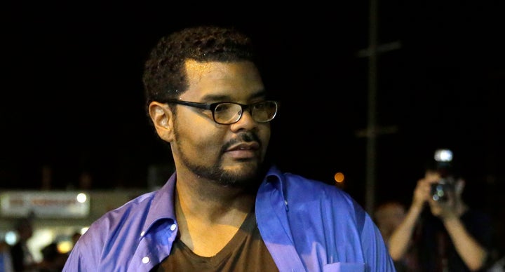 St. Louis Alderman Antonio French works at the scene of a protest on Aug. 18, 2014, in Ferguson, Missouri. French i