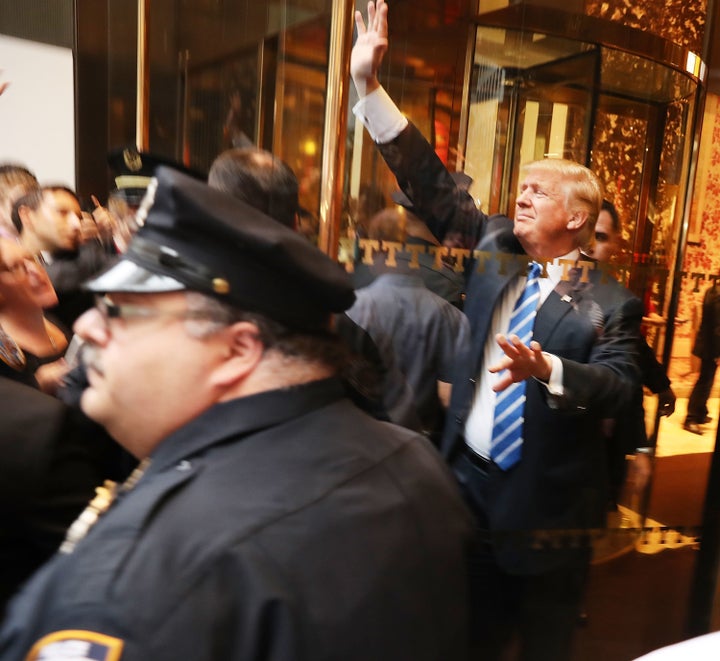 Donald Trump greets supporters outside of Trump Towers in Manhattan October 8, 2016 in New York City.