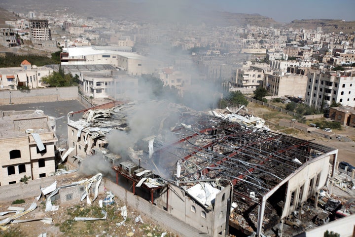 Smoke rises from the community hall where Saudi-led warplanes struck a funeral in Sanaa, the capital of Yemen, October 9, 2016.