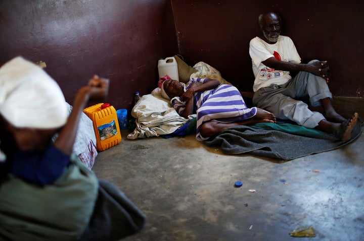 People rest at a shelter set up at a school after Hurricane Matthew passes in Jeremie, Haiti, October 8, 2016.