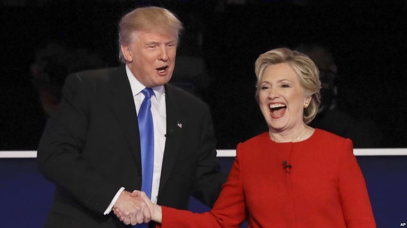 Trump and Clinton shaking hands after their first debate.