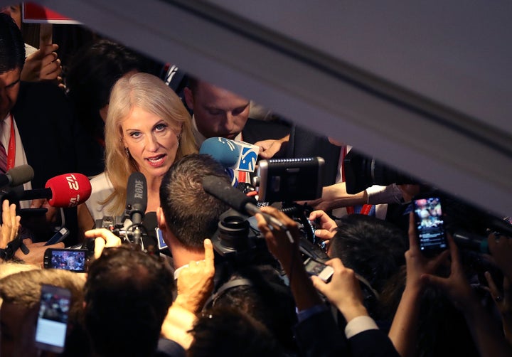 Kellyanne Conway, Donald Trump's campaign manager, talks with reporters in the spin room after the debate.