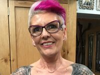 Woman Celebrates Five Years in Remission with Tattoo Over Double