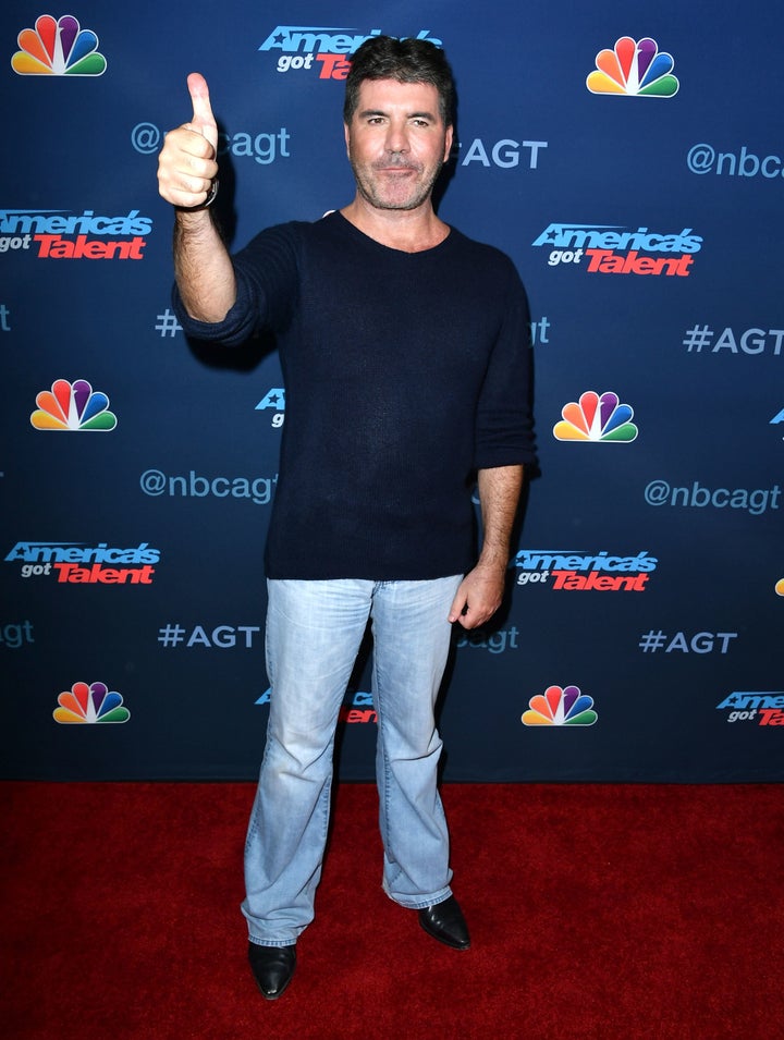 <strong>Simon Cowell and his thumb</strong>