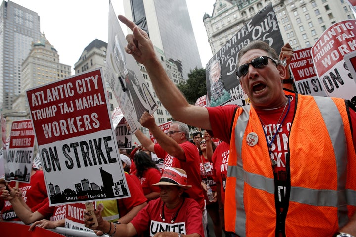 Striking workers from the Trump Taj Mahal Casino in Atlantic City, New Jersey, protest outside the offices of investor and casino owner Carl Icahn in midtown Manhattan, New York City, New York, U.S., July 13, 2016.