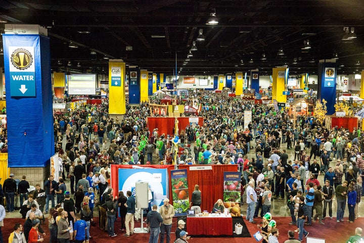 Attendees swarm a section of the main hall at the Colorado Convention Center during the Great American Beer Festival.