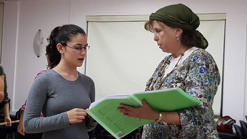 Michal Moore as Lot, Ellen Macales offering guidance as Music Director