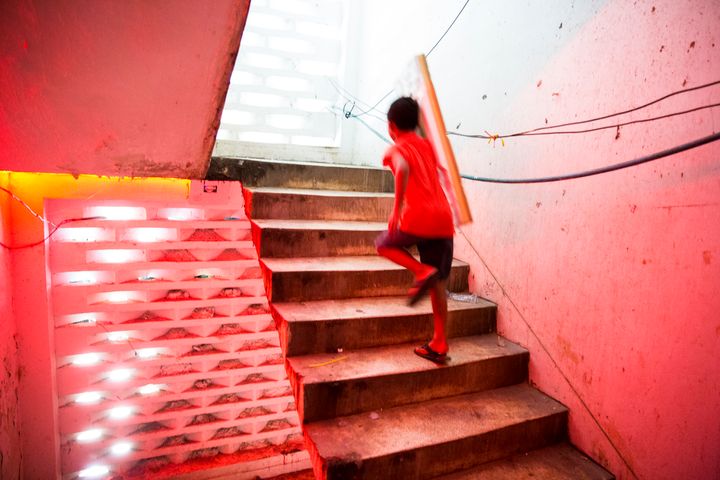 Inside the stairwell of a brothel community in Phnom Penh