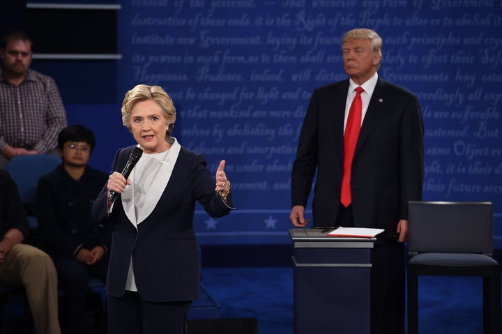 Hillary Clinton, Donald Trump and Donald Trump's necktie stand on the debate stage at Washington University in St. Louis, Missouri.