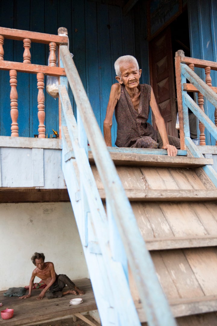 A woman and her son, frail from malnourishment