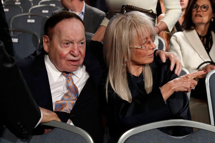 Billionaire casino magnate Sheldon Adelson sits with his wife Miriam as they await the start of the first debate between Republican U.S. presidential nominee Donald Trump Democratic and U.S. presidential nominee Hillary Clinton.