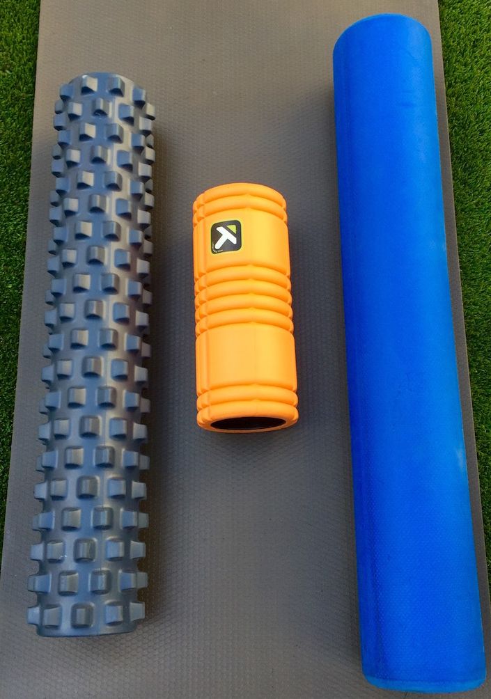My rollers left to right: Bumpy Roller (aka "meat grinder); the Trigger Point Grid; an old school foam roller