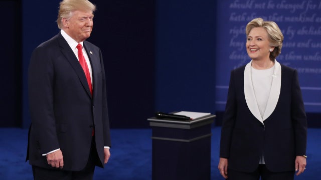 Republican Presidential Nominee Donald Trump and Democratic Presidential Nominee Hillary Clinton on stage during the second o
