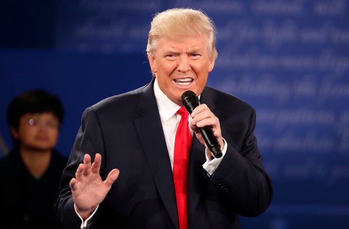 Republican U.S. presidential nominee Donald Trump speaks during the presidential town hall debate with Democratic U.S. presidential nominee Hillary Clinton (not pictured) at Washington University in St. Louis, Missouri, U.S., October 9, 2016.