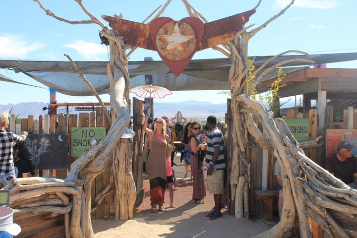 Attendees sitting beneath the shaddy Boogaloo area on Saturday afternoon. 