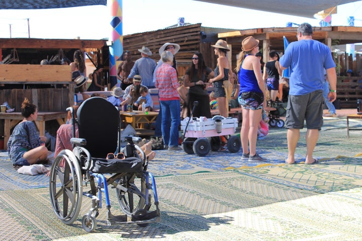 A wheelchair sat in front of the Boogaloo area. There was a designated handicap camping area at the festival. 