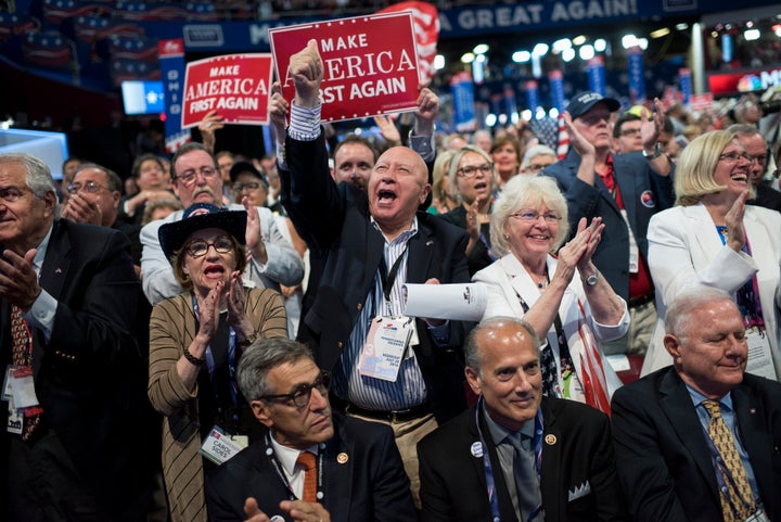 Pennsylvania delegates on the third day of the Republican National Convention in Cleveland, Ohio. Reps. Lou Barletta (R-Pa.), seated at left, and Tom Marino (R-Pa.), seated at center, also appear.