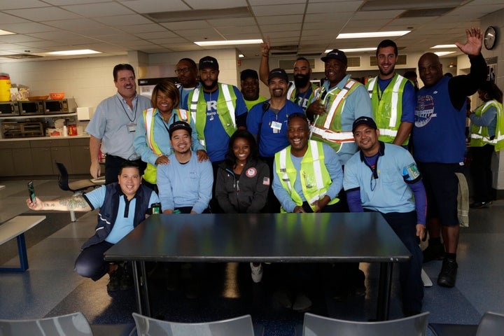 Simone meets with United crew members behind the scenes at O'Hare International Airport.