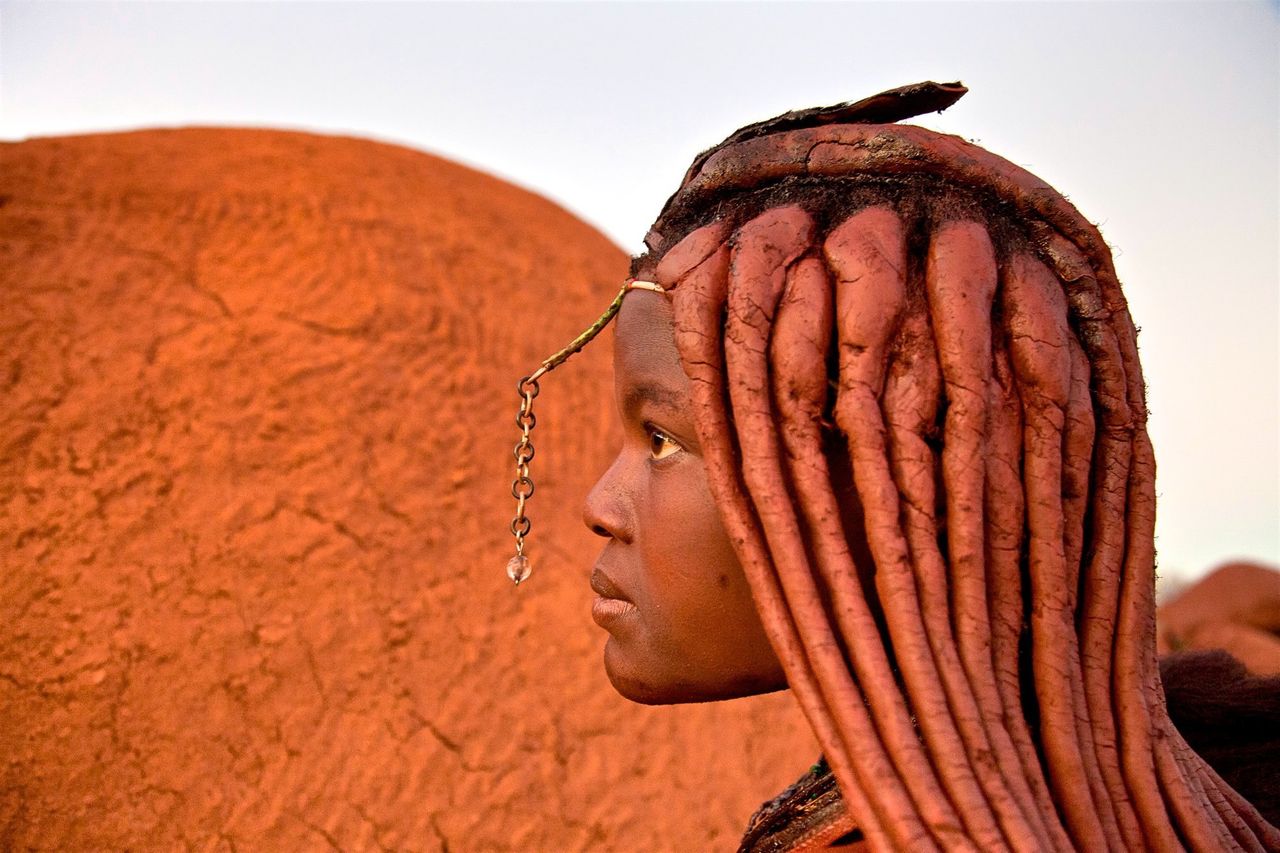 Tajiposa during her "moon cycle ritual." Himba tribe, Namibia.