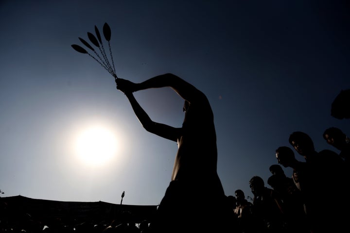 Muslim devotees take part in a mourning procession marking the day of Ashura in Islamabad, Pakistan on Oct. 11.