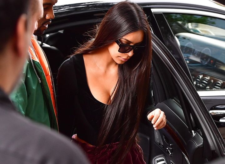 Kanye West and Kim Kardashian arrive at their Manhattan apartment on Oct. 3.