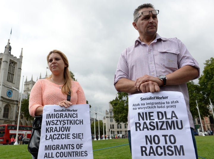 Demonstrators supporting the rights of Polish workers in the UK