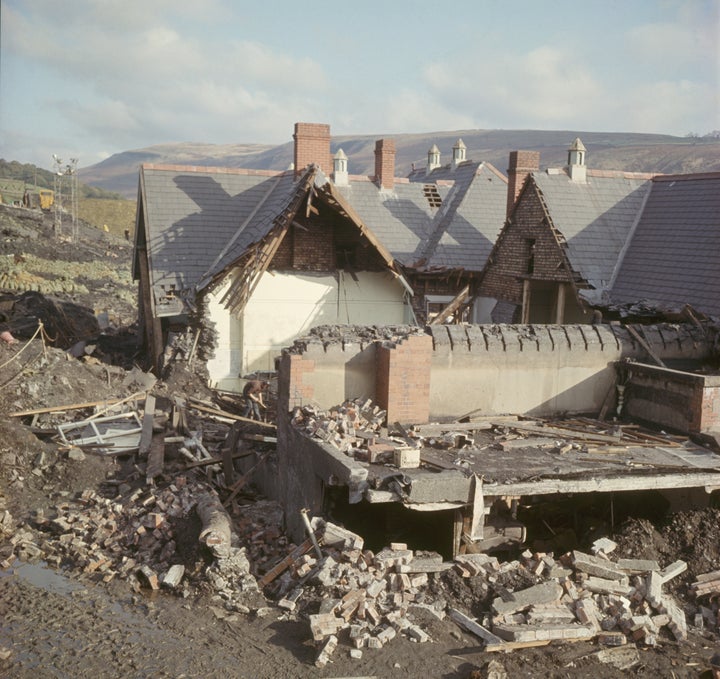 Around 100,000 tonnes of rubble smashed into the school and nearby houses