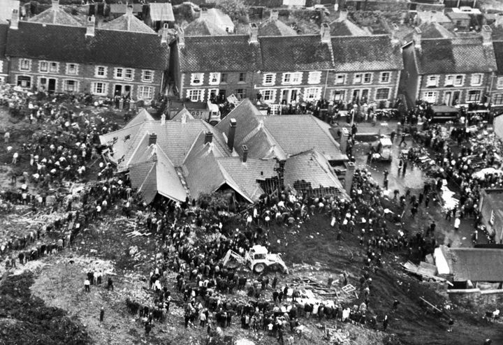 Pantglas School is seen buried in rubble after the slip