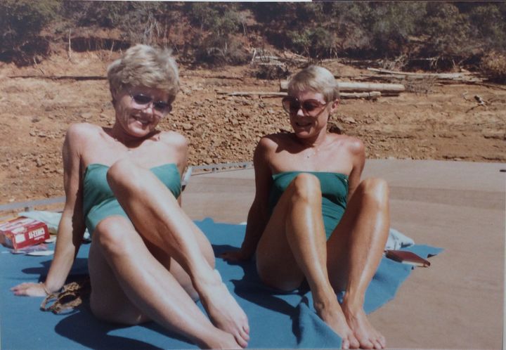 My mom (right) and her twin sister on a family house boating trip to Lake Shasta