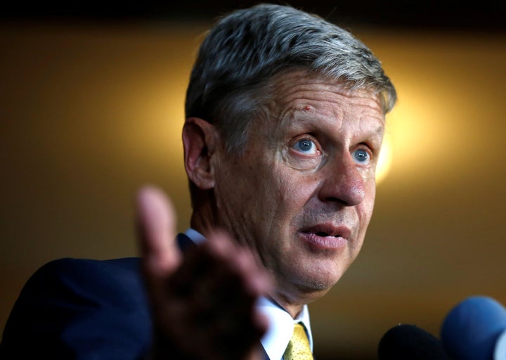 Gary Johnson says that his support for private prisons does not conflict with his criminal justice platform.