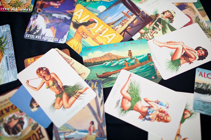 Vintage postcards are a fun way to get guests to participate in a guest book at a travel-inspired wedding.