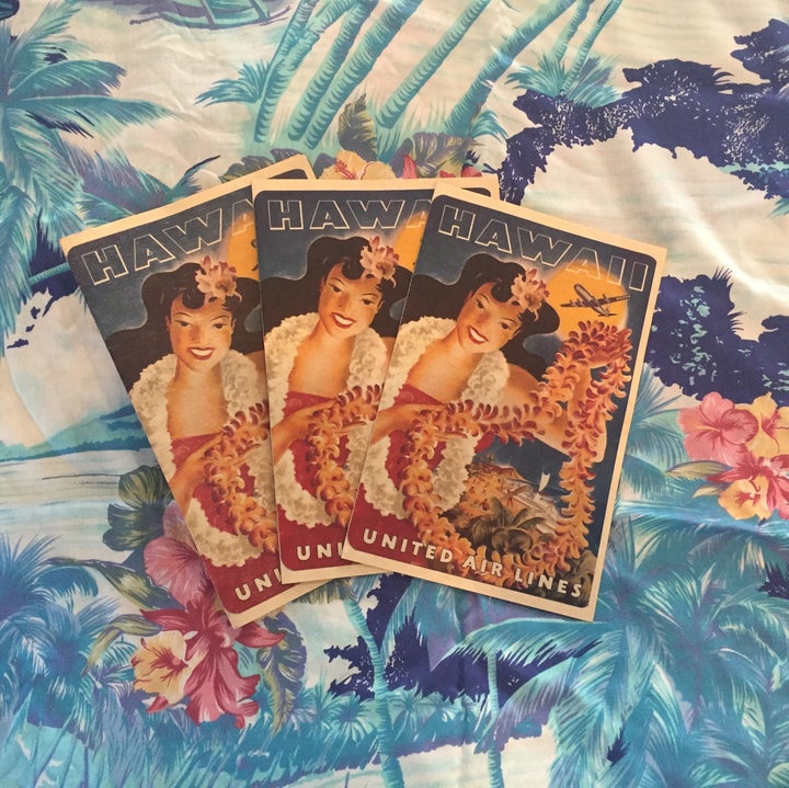 I designed our wedding program myself using my favorite vintage Hawaii travel poster as the graphic and then printed them at Costco.