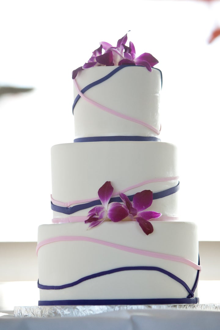 We added purple orchids to the cake for the tropical travel element.