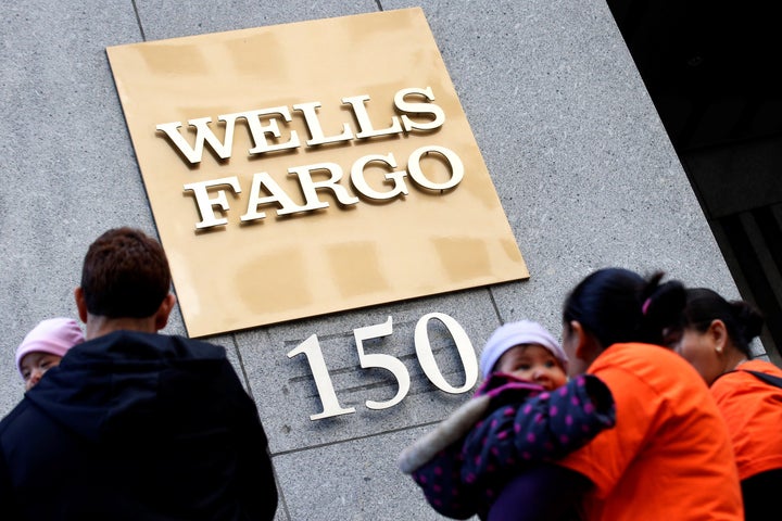 Protestors gather outside the Wells Fargo & Co corporate campus in Manhattan, New York City, U.S., October 6, 2016.