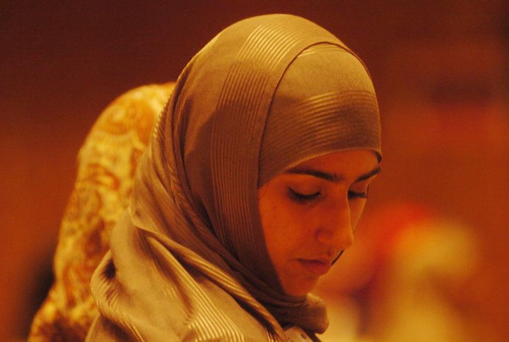 A muslim woman wears a hijab in Kensington, London