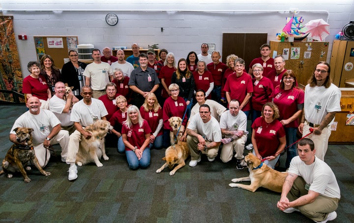 Everyone at the reunion gathers for a group photo.