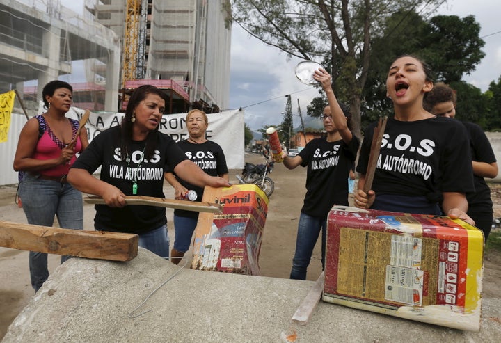 Residents of the Vila Autodromo favela in Rio de Janeiro protest against their displacement ahead of the 2016 Olympics.