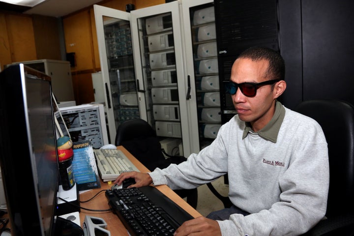 A scientist works on a computer at the Center for Genetic Engineering and Biotechnology in Havana on March 4, 2013. The island's drugs will face less regulatory hurdles entering the U.S. market after a change announced Oct. 14, 2016 by the Obama administration.