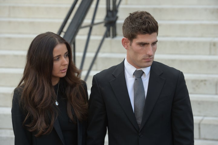 Ched Evans with his partner Natasha Massey outside Cardiff Crown Court, where he has been found not guilty of raping a teenager 