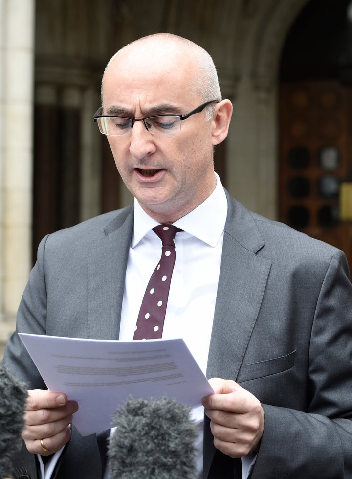 Solicitor Shaun Draycott reads a statement to the media outside the Court of Appeal in London after Evans won his appeal against his conviction 