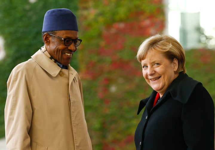 German Chancellor Angela Merkel greets Nigerian President Muhammadu Buhari in Berlin on Oct. 14, 2016.