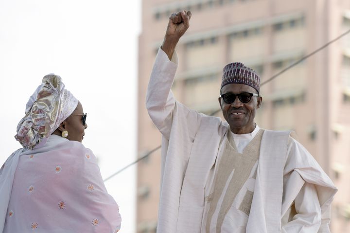 Nigerian President Muhammadu Buhari, pictured with his wife Aisha, scoffed at her on Friday.