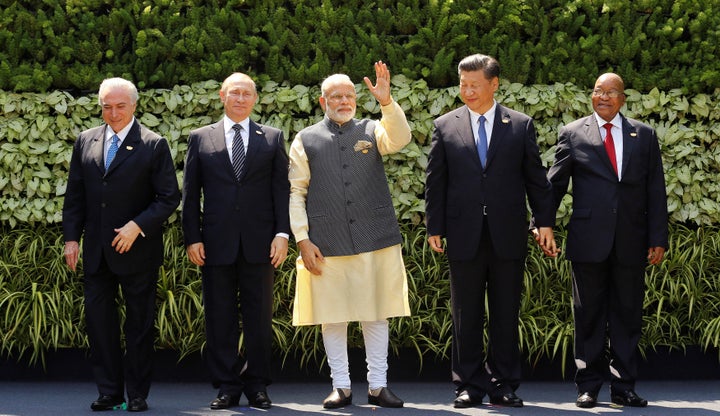 Leaders from BRICS countries pose during a summit in India on October 16.